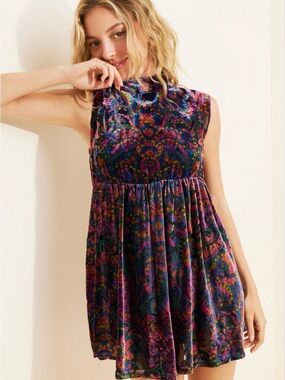 Free People All The Time mini dress is made from dark night velvet